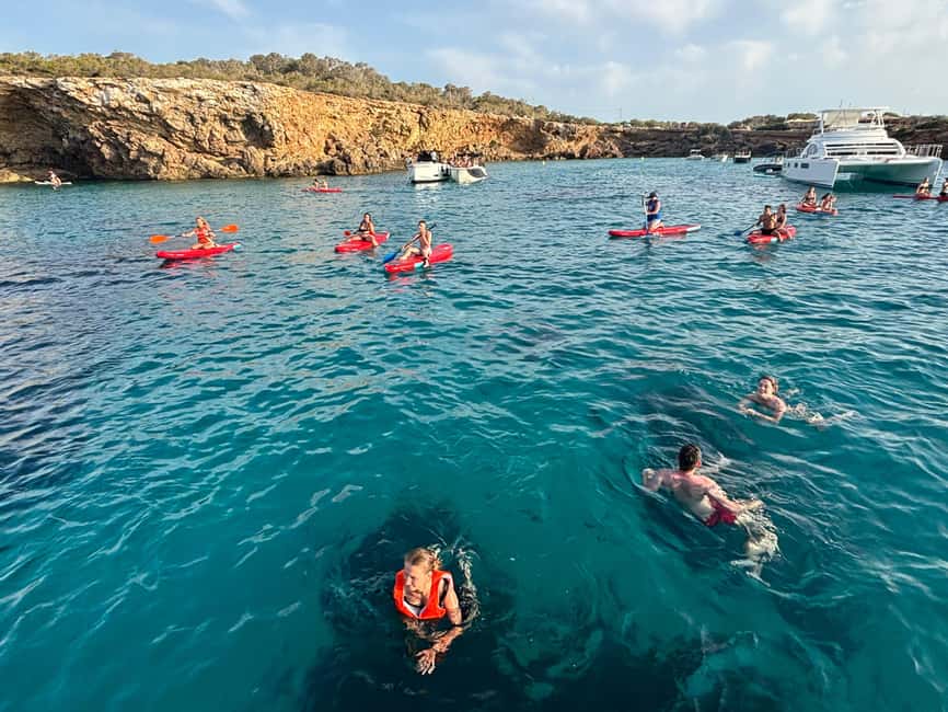 Ibiza: Sunset Boat Tour with Water Sports, Open Bar & Tapas - Cala Bassa: the first major stop