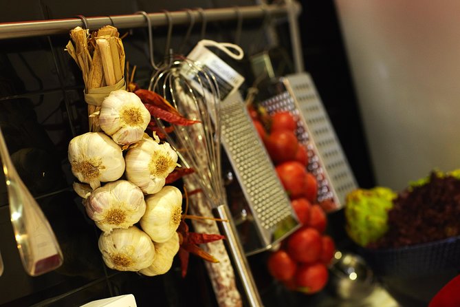 Interactive Paella & Market: Bottomless Wine & Rambla Views - The instructors shape the experience