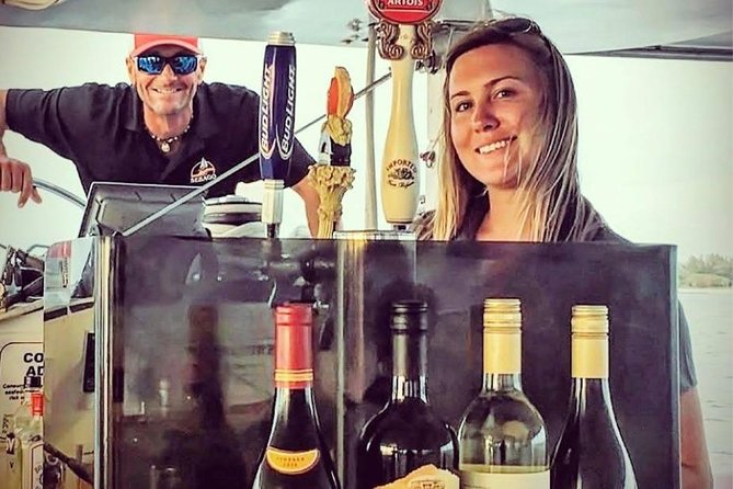 Key West Sunset Sail: Dolphin Watching, Wine, and Tapas - Fort Zachary Taylor and Sunset Key