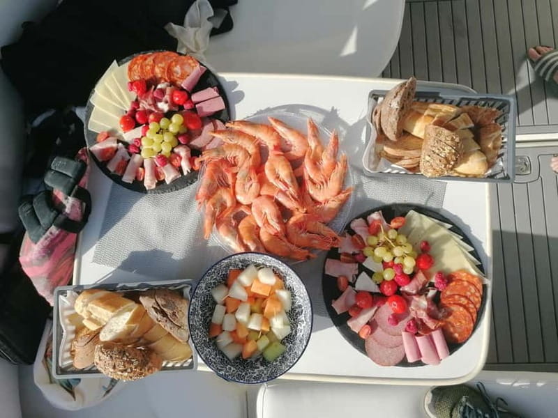 Lagos: Private Luxury Cruise with Tapas and Drinks - Tapas, Fruit, Drinks, and Chilled Champagne