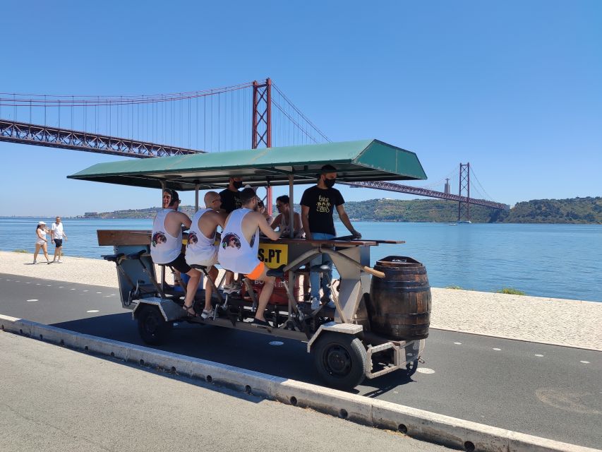 Lisbon: 1-Hour Beer Bike Tour with Draft Beer & Sangria Ride - The bridge photo stop