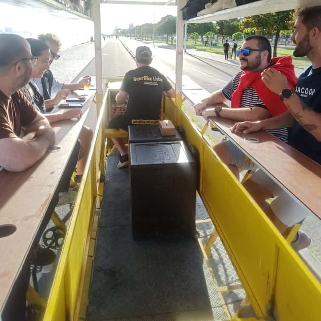 Lisbon: 1-Hour Beer, Sangria or Wine Bike Sightseeing Tour - The bridge photo stop and river views
