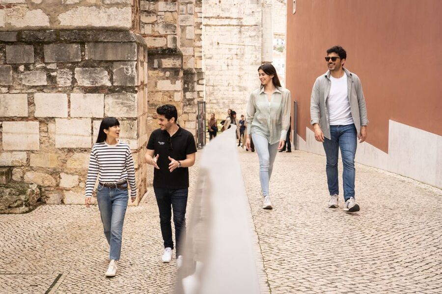 Lisbon: Alfama Charms, Tapas, Wine and Sunset Boat Cruise - Sailing the Tagus as Lisbon lights up