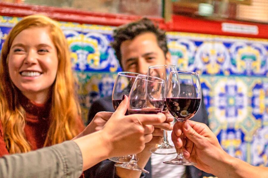 Lisbon: Alfama Charms, Tapas, Wine and Sunset Boat Cruise - Walking through Alfama’s oldest streets