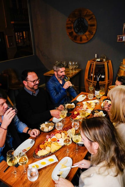 Lisbon: Premium Wine and Tapas Tasting Session - Lisbon Winery makes one table feel like a tour of Portugal