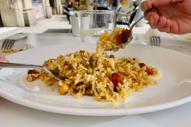 Lunchtime Tapas Tour in the Eixample with The Barcelona Taste - Eating through two or three carefully chosen venues