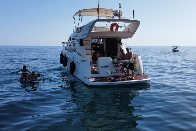 Luxury Yatch trips + Open Bar + Tapas + Paddle Surf + Snorkel - A small group helps, but does not guarantee luxury