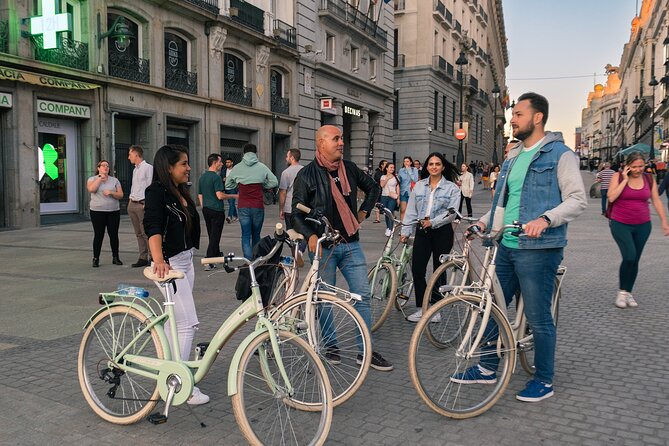 Madrid at Night: Vintage Bike Tour of City Highlights - Plaza Mayor and the squid sandwich stop