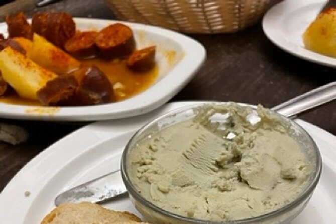 Madrid by Night Small Group Tour: Stories, Sights and Tapas Bites - A walking tour with food, not a restaurant dinner