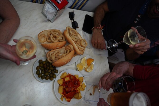 Madrid by Night: Tapas Crawl, Local Drinks & Hidden Gems - La Latina, small bars, and Madroño liqueur