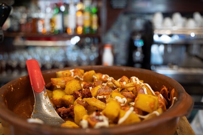Madrid by Night: Tapas Crawl, Local Drinks & Hidden Gems - Plaza Mayor and the calamari sandwich