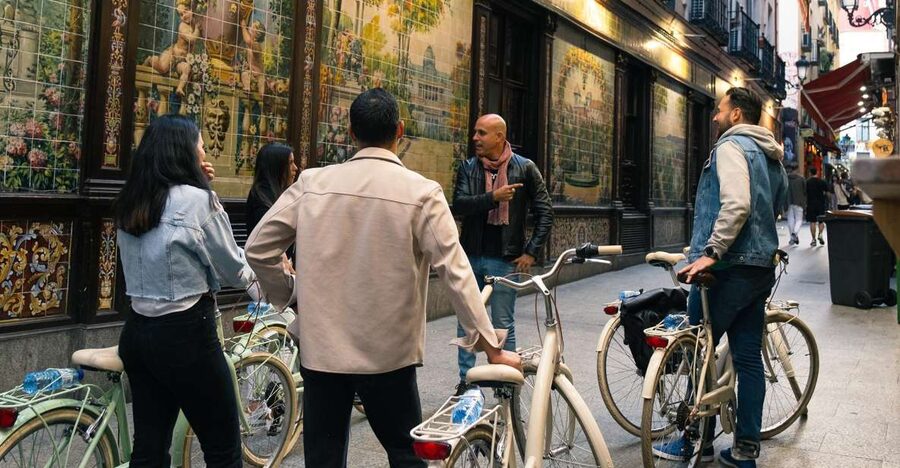 Madrid by Night: Vintage Bike Tour Highlights/Optional Tapas - Starting in Las Letras as Madrid turns golden