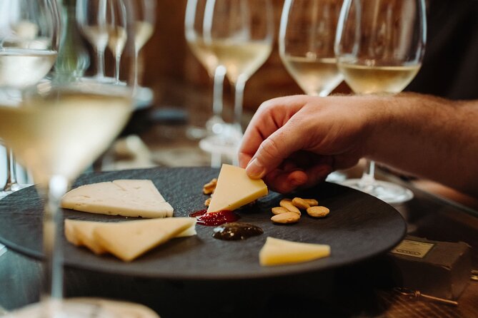 Madrid Evening Tapas and Wine Guided Tour - La Osita: vermouth, cheese, and the porrón challenge