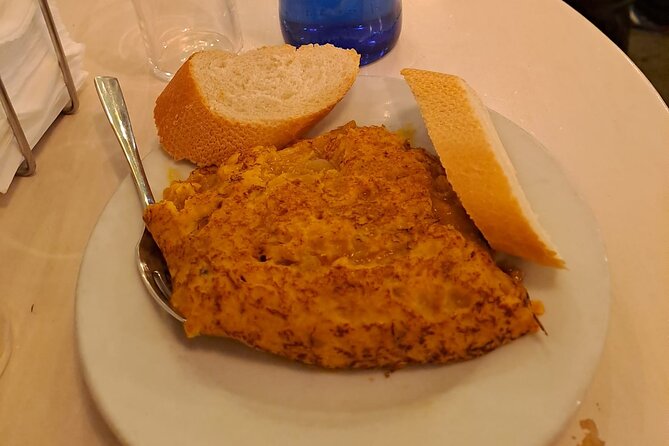 Madrid Food Tour: Tapas, Drinks and Delights with a Local - Potato tortilla near Plaza de Jacinto Benavente