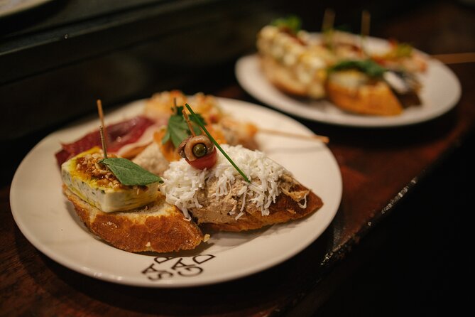 Madrid Food Walking Tour with Tapas and Vermouth - Chorizo-filled mushrooms near Cava de San Miguel