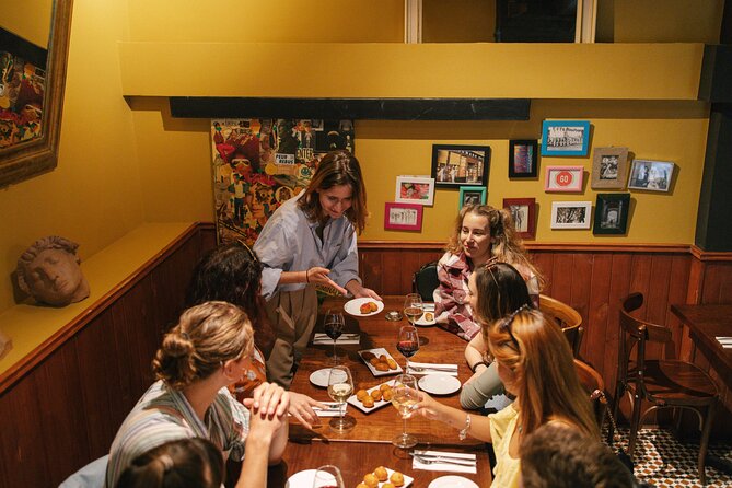 Madrid Food Walking Tour with Tapas and Vermouth - Tortilla, goat cheese, and a cold beer