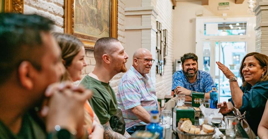 Madrid: Food & Wine Tour with 10 Tapas & 4 Drinks Included - A social night with very little walking