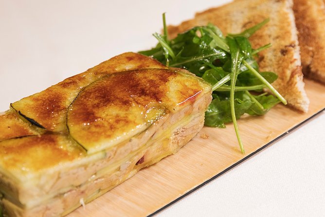 Madrid Gourmet Tapas Small Group Tour - Third venue: A local favorite with a notable crowd