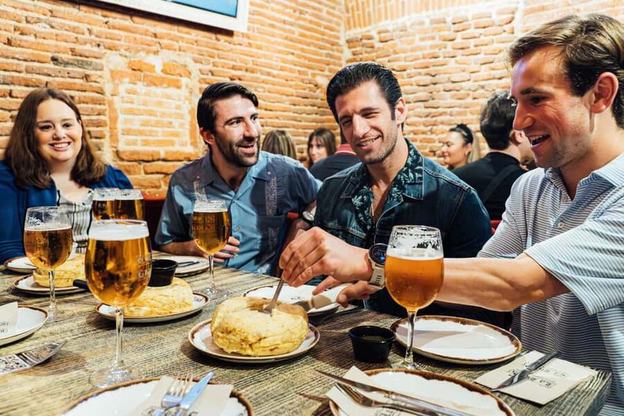 Madrid Guided Food Tour with Tapas and Spanish Wine - The guides and the group atmosphere