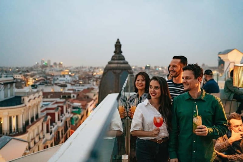 Madrid: Guided Tapas and Wine Tour with Rooftop Views - Ham, Iberian sausages, and a walk through Plaza Mayor