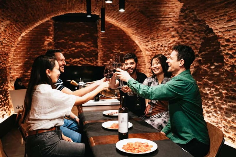 Madrid: Guided Tapas and Wine Tour with Rooftop Views - Starting at Plaza de San Miguel and entering La Latina