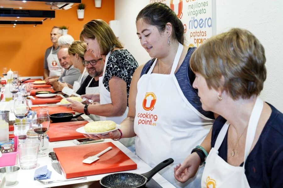 Madrid: Half-Day Spanish Cooking Class - What the market visit adds to the paella class