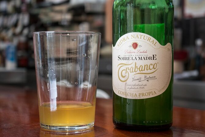 Madrid Historic Centre Food Tour with Authentic Tapas & Wines - Tapas, cider, and the local vermouth habit