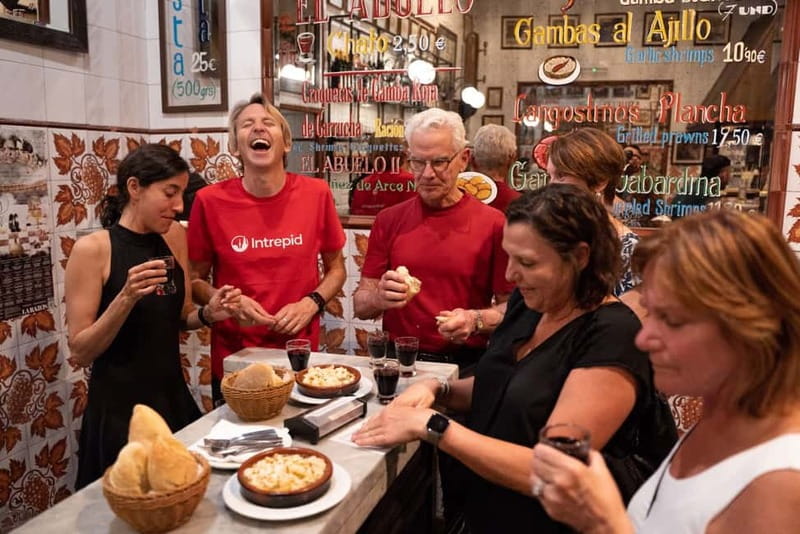 Madrid: Local Tapas, Drinks, and Hidden Gems Walking Tour - Shrimp, Spanish wine, and the final dessert