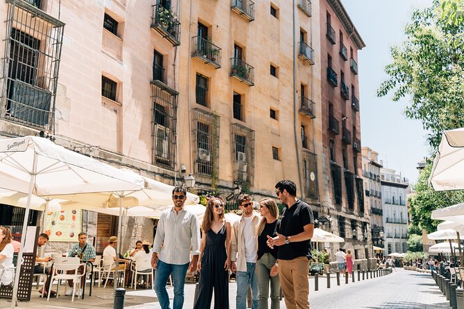 Madrid Local Tapas, Wine Bars & Flamenco Show - Beef cheeks and wine on Calle de las Huertas