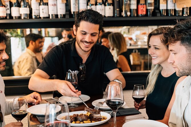 Madrid Local Tapas, Wine Bars & Flamenco Show - Iberian ham near Calle del Arenal