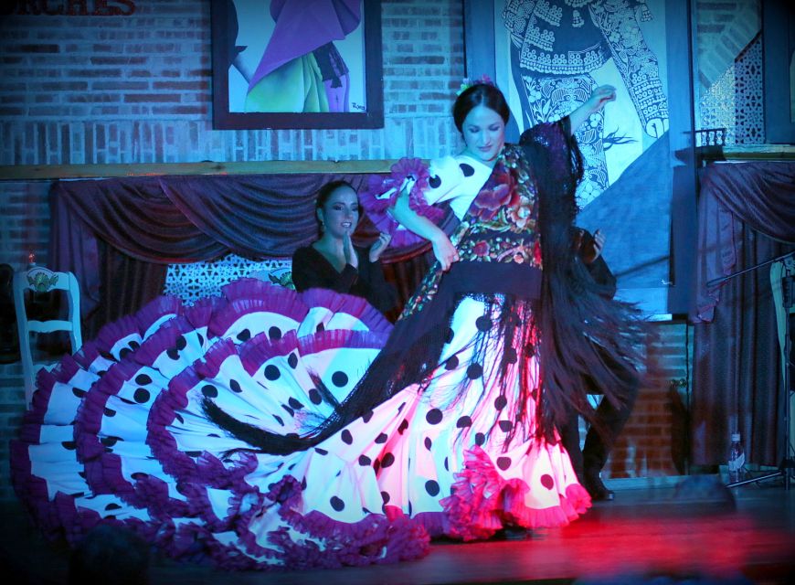 Madrid: Los Porches Flamenco Show with Tapas and Wine Ticket - Walking into Tablao Flamenco Los Porches