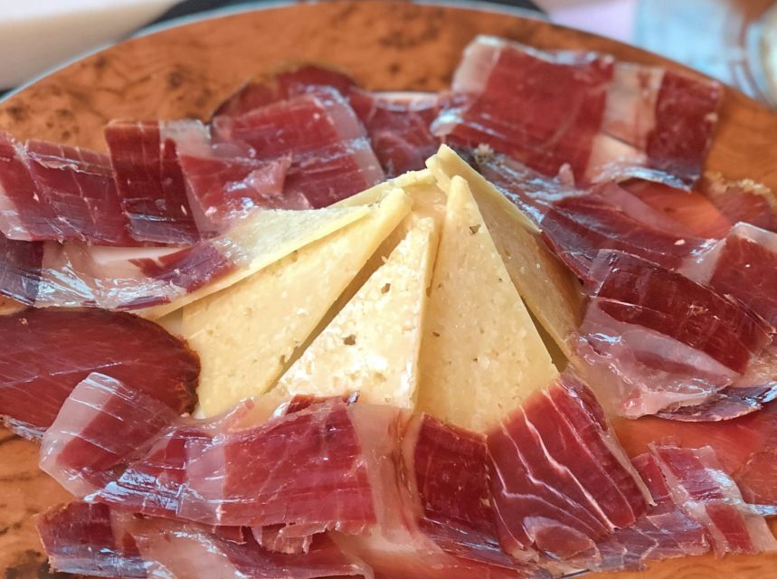 Madrid: Los Porches Flamenco Show with Tapas and Wine Ticket - The tapas and wine question
