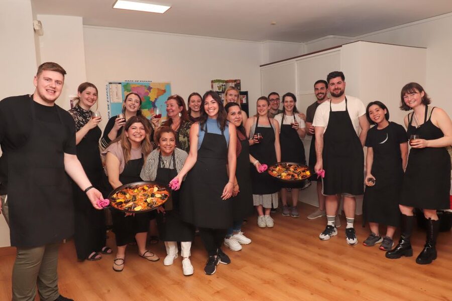 Madrid: Paella and Sangria Workshop in the City Center - Chopping, stirring, and sharing the work