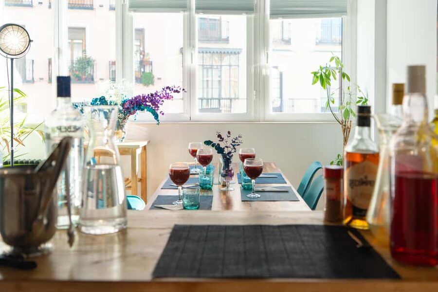 Madrid: Paella & Sangria Classes – Seafood, Chicken or Vegan - Sitting down to eat your own paella