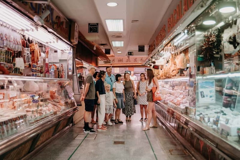Madrid: Paella & Tapas Cooking Class and Market Visit - Paella Valenciana takes center stage