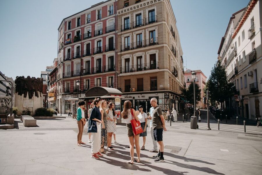 Madrid: Paella & Tapas Cooking Class and Market Visit - Sitting down to eat your own Spanish lunch