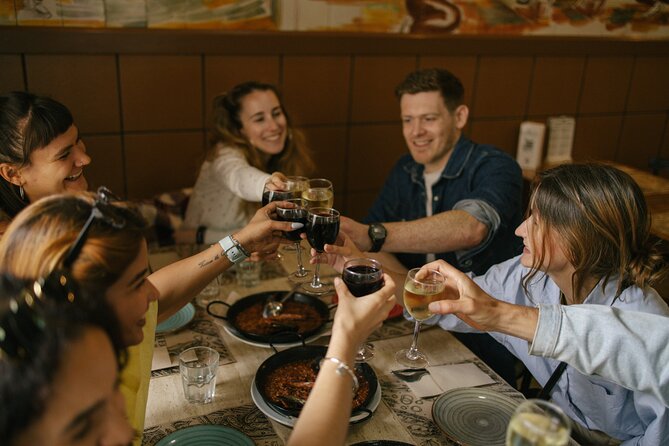 Madrid: Private Tapas & Wine Food Walking Tour in La Latina - Calle de Toledo: a squid-ink sandwich with sweet wine