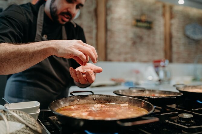 Madrid Tapas & Paella Cooking Experience with Local Market Visit - Making tapas, croquetas, and patatas bravas