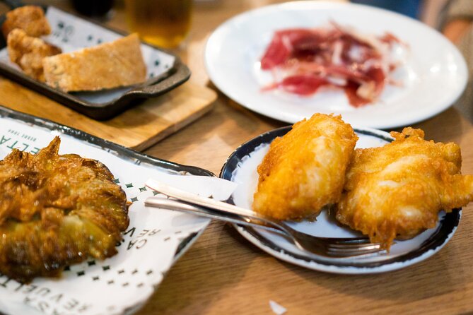 Madrid Tapas Tour with Food and Drink - Calle de Bordadores provides the final meal
