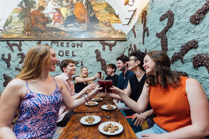 Madrid: Tapas Walking Tour with Food and Drinks Included - Cava Baja and the hour of vermouth