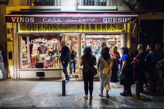 Madrid Tapas & Wine Tasting Walking Tour – Small Group Local Bars - Calle de la Cruz and the open kitchen