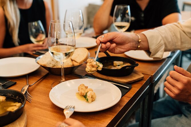 Madrid Tapas & Wine Tour with Rooftop Views and Local Guide - The rooftop finish at 6:00 PM