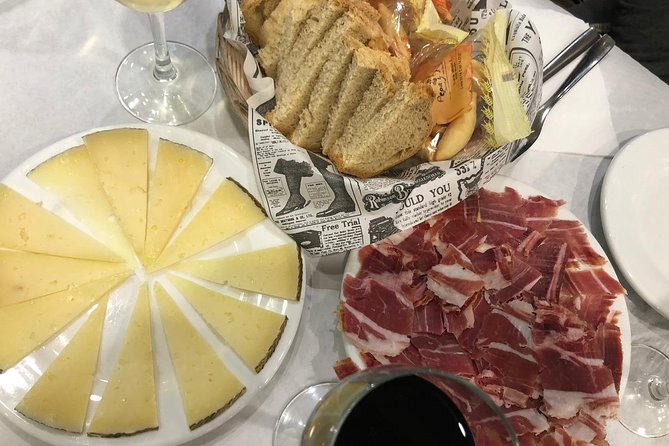 Malaga Food Tour: Tapas, Drinks and Delights with a Local - Stop three: Plaza de la Merced and Andalusian tapas