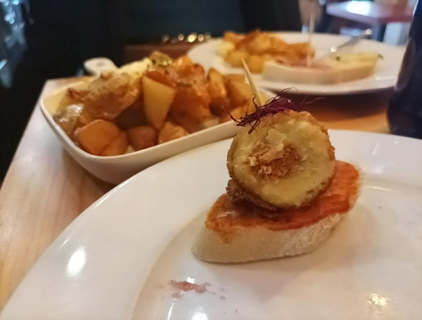 Malaga: Food Tour with Local Guide, Tapas, and Drinks - Dessert with locas de Málaga or pionono