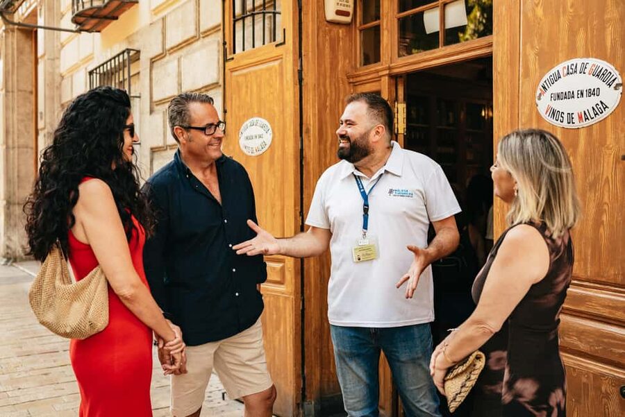 Malaga's tradition and tapas tour with Official Guide - Walking past Larios Street, the cathedral, and Picasso Museum