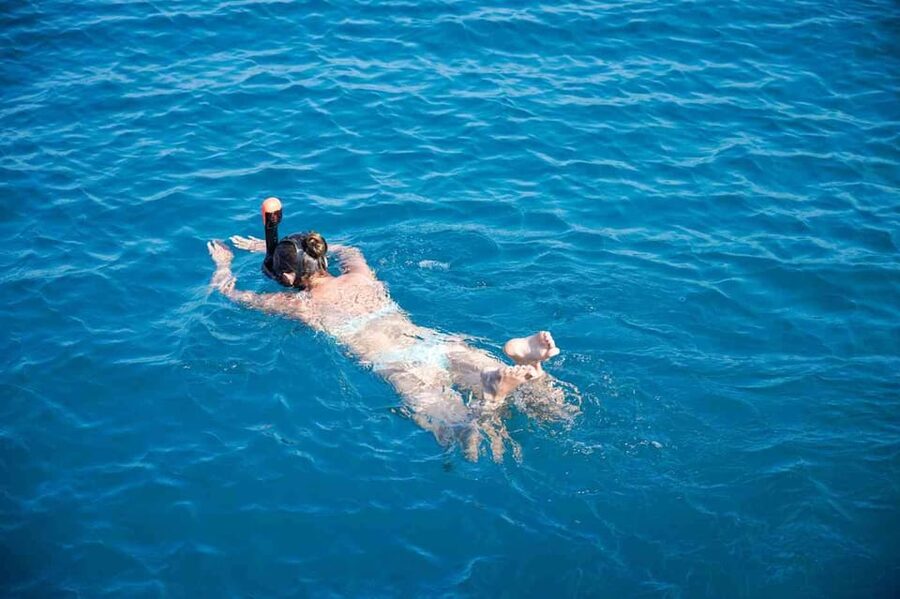 Malaga: Sailing Catamaran with Swimming and Paella Lunch - Your Included Drink and the Onboard Mood