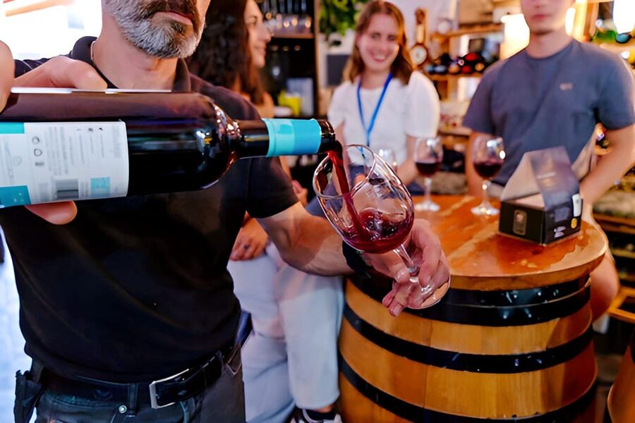 Malaga: Wine and Tapas Tour with Tastings and Drinks - First stop: Malaga tapas and a lesson in local eating