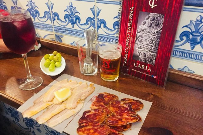 Marbella Food Tour: Tapas, Drinks and Delights with a Local - Anchovies and croquettes at Plaza de la Victoria