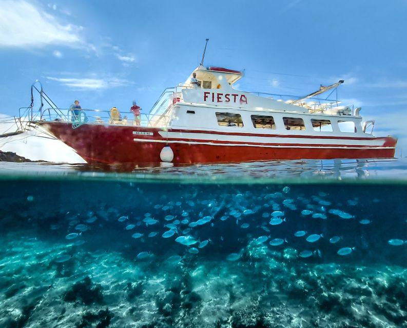 Menorca: Full-Day Boat Tour with Paella Lunch - Cala en Turqueta gives you the longest beach stop