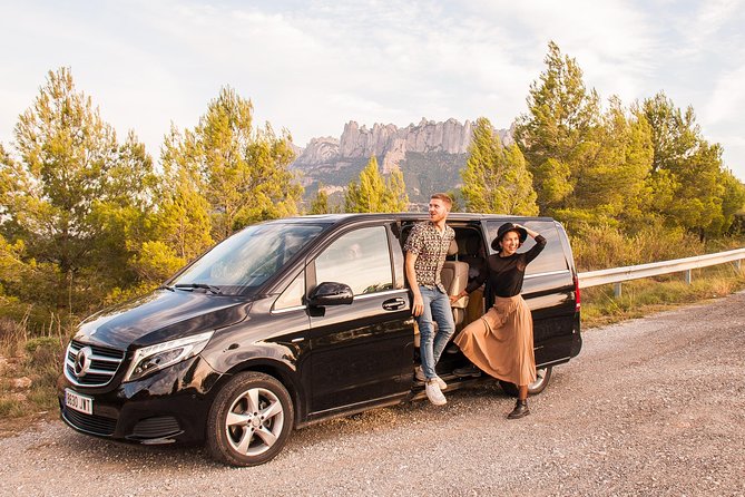 Montserrat Half-Day Tour with Tapas and Gourmet Wines - Reaching Montserrat and its mountain monastery